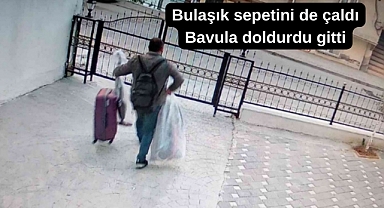 Seçtiği eşyaları valize koyup çaldı