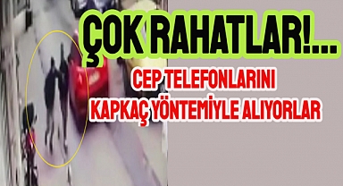 Kapkaççı yolda yürürken cep telefonu çaldı
