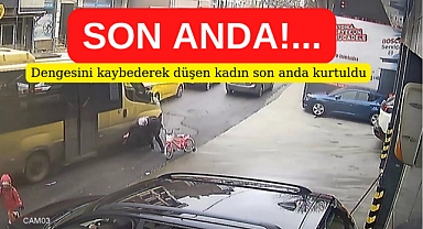 Dengesini kaybetti, minibüsün altında kalmaktan son anda kurtuldu